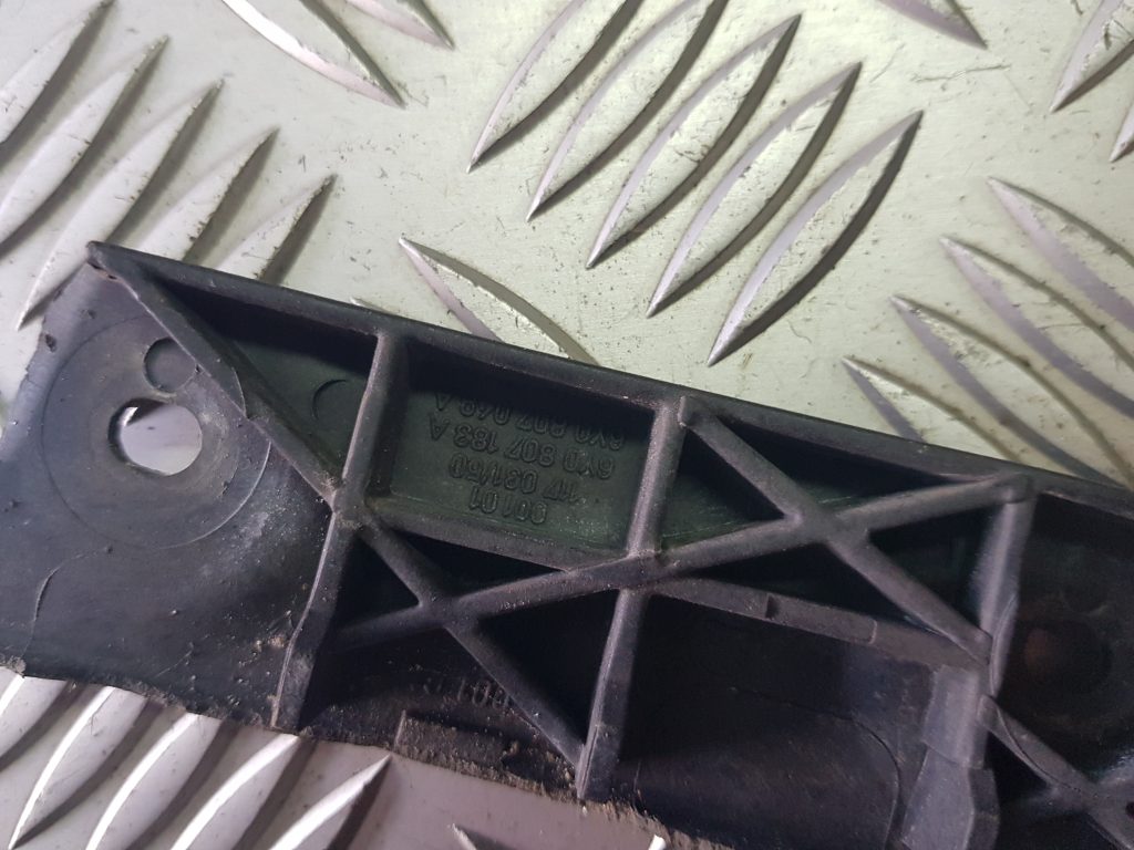 Priekšējā spārna un bufera stiprinājums priekš ŠKODA FABIA 2003