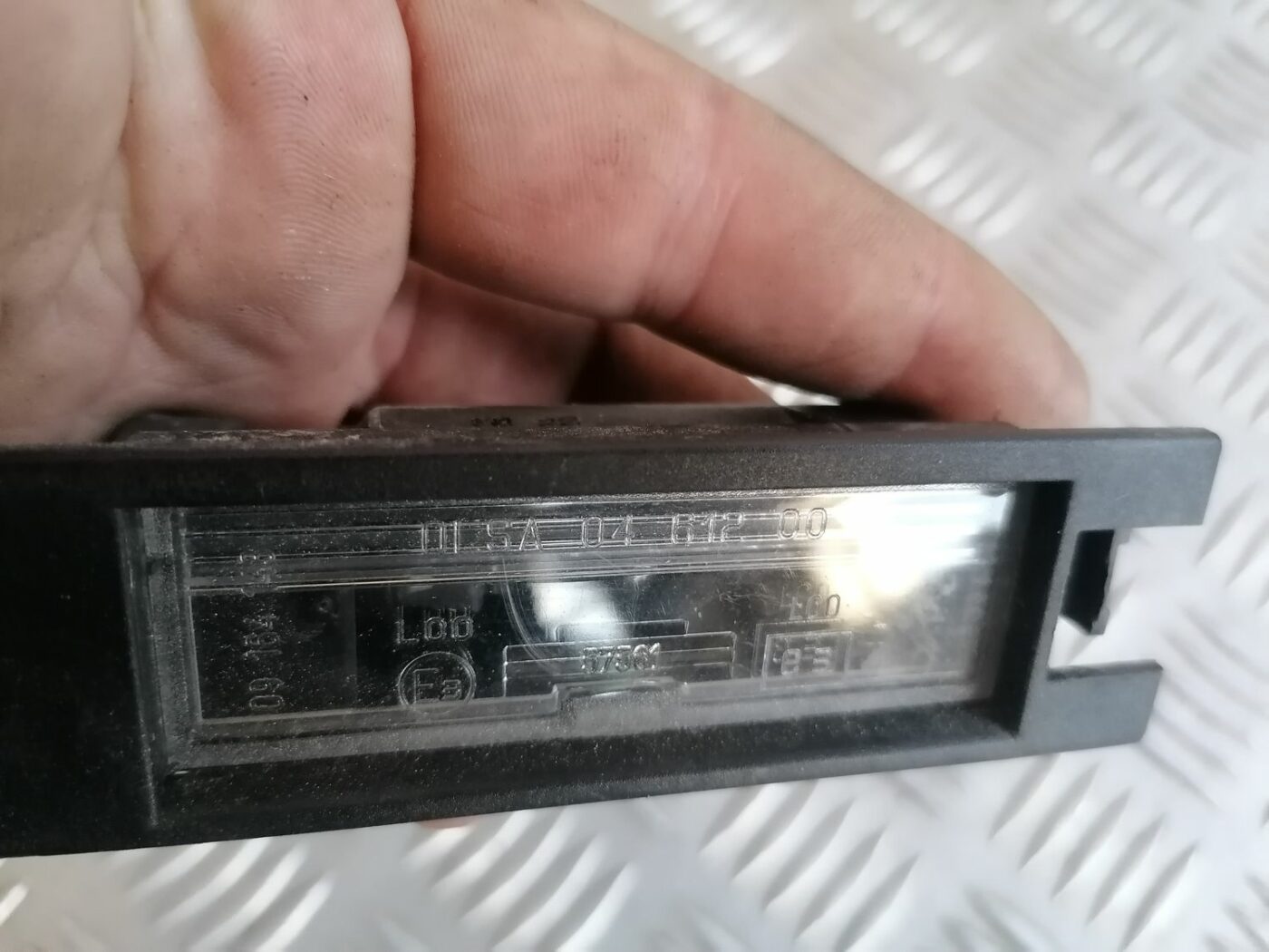 Numura zīmes apgaismojums priekš OPEL MERIVA 2004 5 Numura zīmes apgaismojums priekš OPEL MERIVA 2004