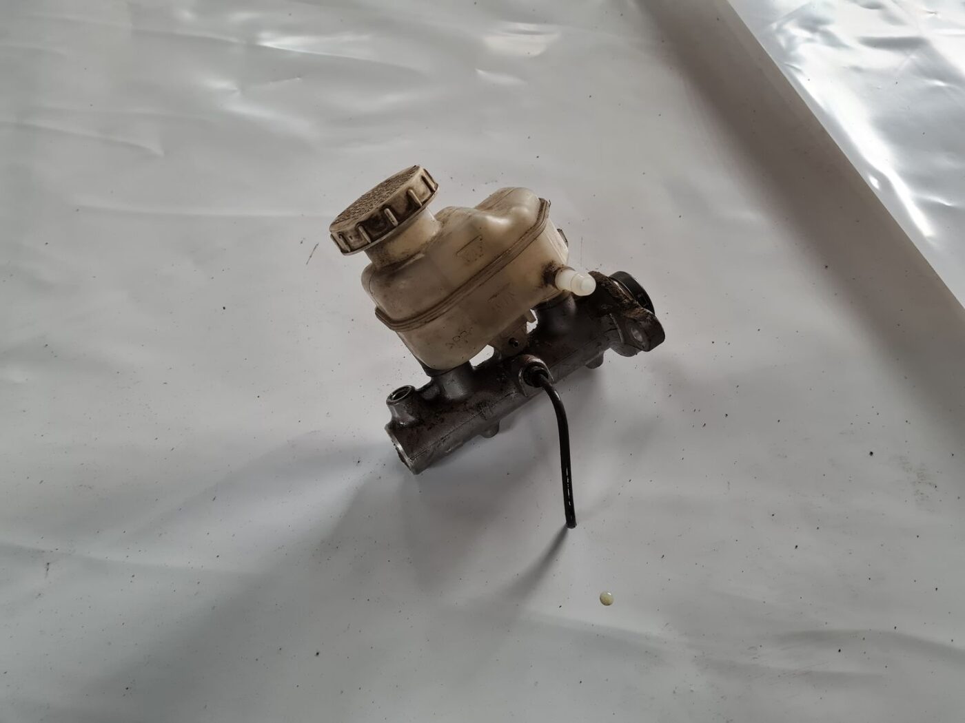 Bremžu pastiprinātāja galvenais cilindrs priekš MITSUBISHI LANCER 2006