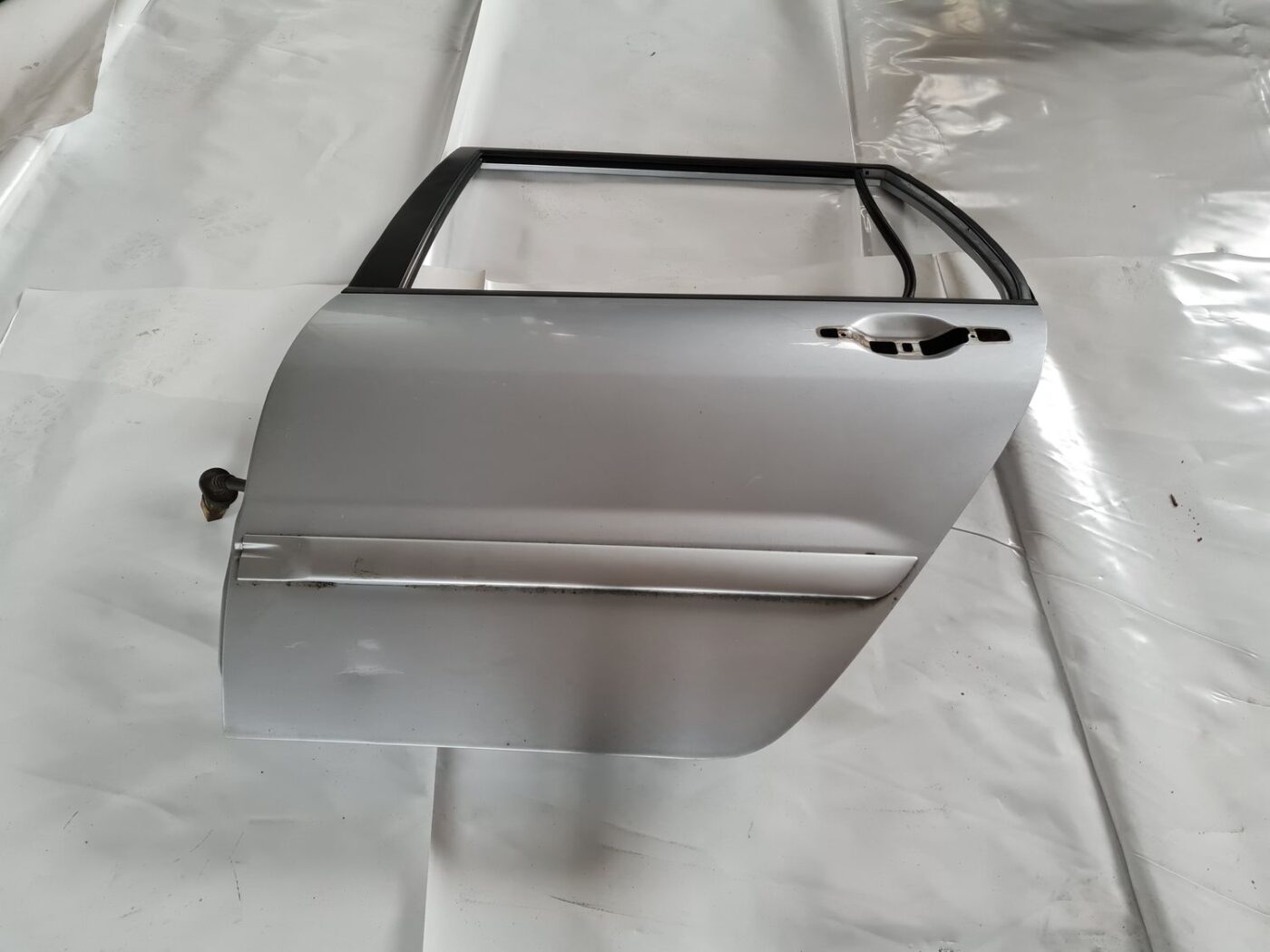 Aizmugurējās kreisās durvis priekš MITSUBISHI LANCER 2006