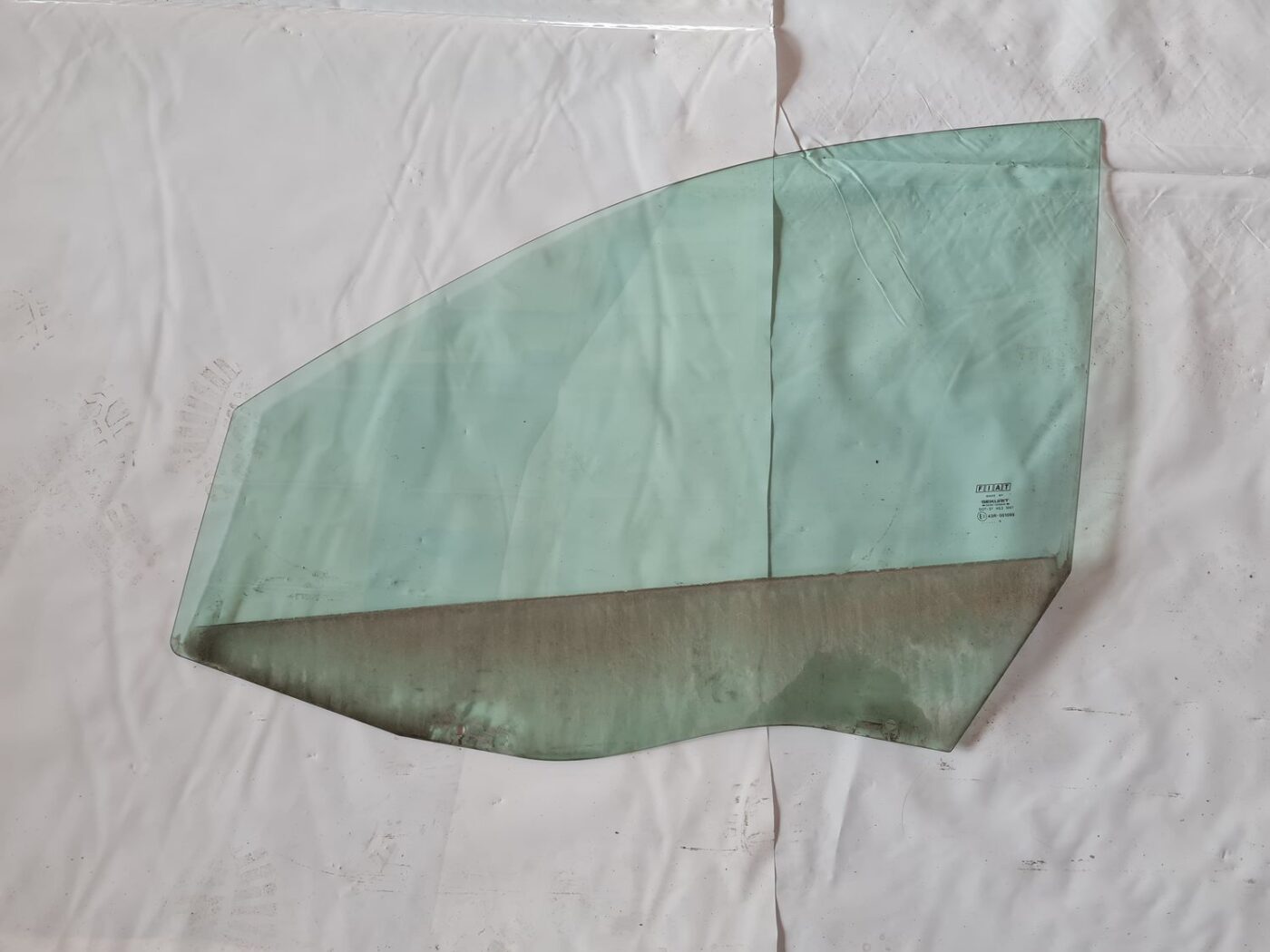 Priekšējo kreiso durvju stikls priekš FIAT STILO 2003 1 Priekšējo kreiso durvju stikls priekš FIAT STILO 2003