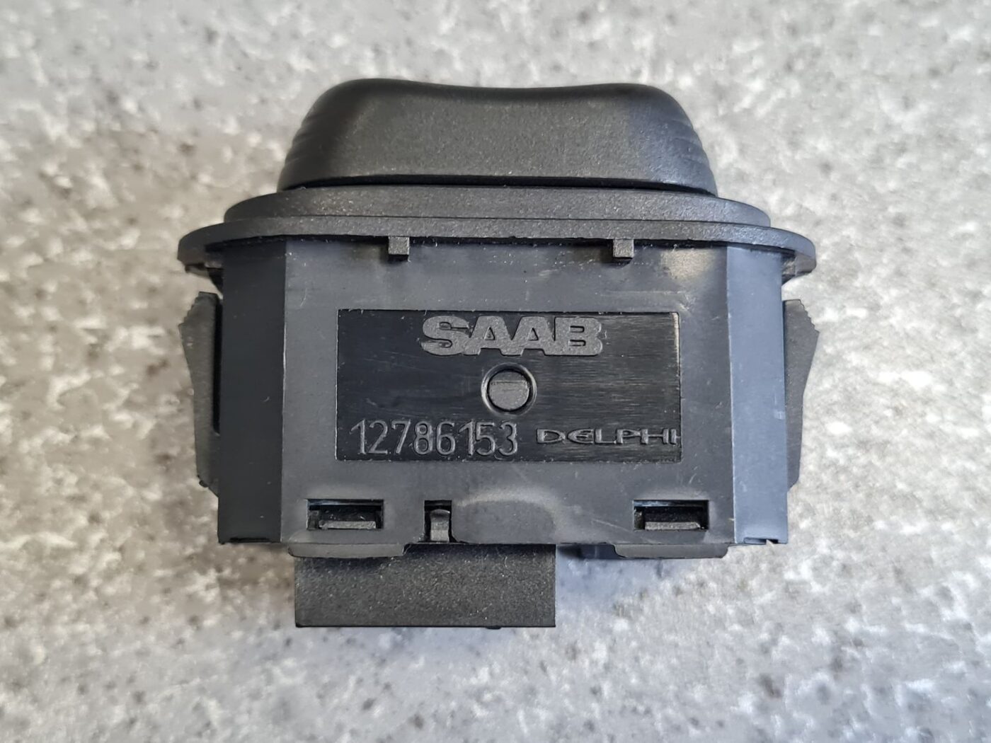 Jumta lūkas atvēršanas poga/rokturis/slēdzis priekš SAAB 9-3 2002